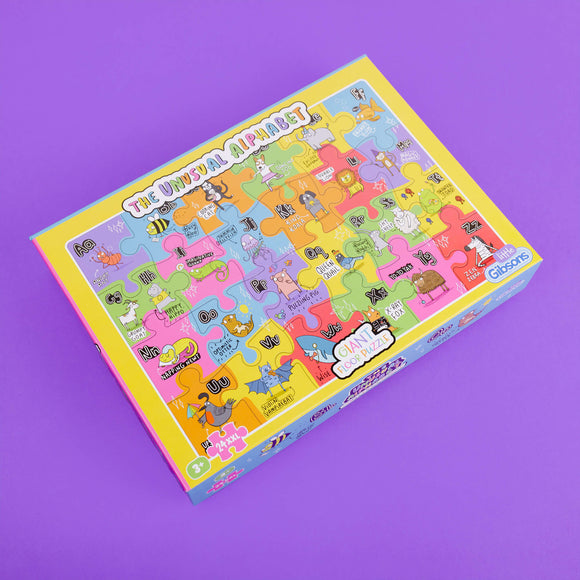 The unusual alphabet giant floor puzzle box by Katie Abey with fun characters on a purple background