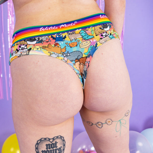 Close up of Florence in the Wilde Mode x Katie Abey thong showing her bottom with lots of fun characters and a rainbow waistband