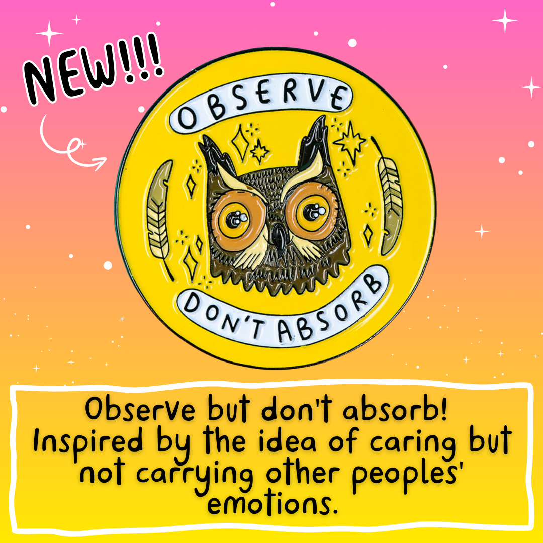 The Observe Don't Absorb Enamel Pin Badge on a yellow and teal card background. The yellow base circle soft enamel pin has a brown smiley owl with big eyes surrounded by sparkles and two feathers with text in white banners reading 'observe don't absorb'.