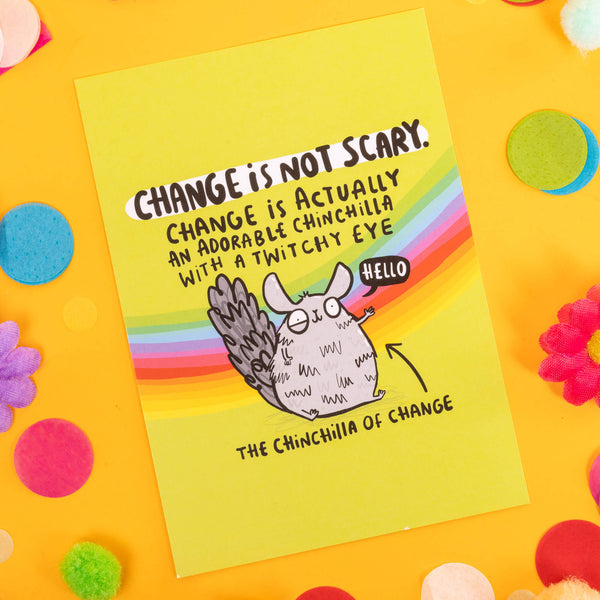 Postcard of a chinchilla waving saying Hello with an arrow saying The Chinchilla of change. Above it, it says change is not scary. Change is actually an adorable chinchilla with a twitchy eye. It is on a green background with a rainbow. The postcard is on a yellow background with confetti, fake daisies and pom poms. 