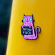 Swear Word Pink and Black Cat Fridge Magnet holding funny sign. Designed by Katie Abey in the UK
