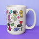 A playful white mug by Katie Abey decorated with an array of whimsical monsters and encouraging phrases like "You lookin' fly" and "Small steps every day," set against a soft purple backdrop.