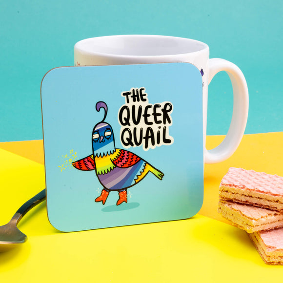 Queer Quail Coaster is a rainbow illustration of a quail with red boots on looking fabulous illustrated by Katie Abey next to it text reads 'the Queer Quail