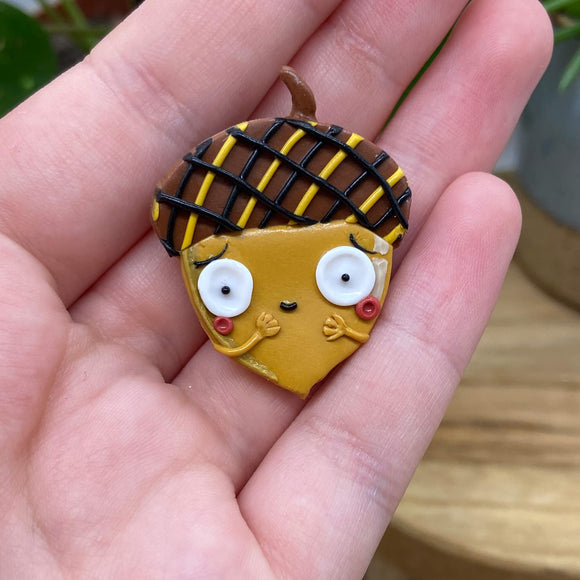 Acorn of anxiety pin badge. Personalised backing card and hand made using polymer clay by Katie Abey X Little Acorn Designz in the UK