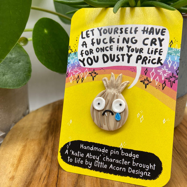 Handmade Resin Pin Badge featuring a sad crying onion 'Let yourself have a cry for once in your life you dusty swear word' Designed by Katie Abey in the UK