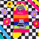 A pair of rainbow striped socks with a purple cat in the middle holding a sign saying bellend. They are on a checkerboard black and white background with flowers and ribbons