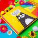 The Cattitude Book illustrated by Katie Abey. The book is open to reveal two pages one is bright yellow with a close up cat illustration with text above reading YOU DONT ALWAYS HAVE TO BE BUSY SOMETIMES YOU CAN JUST BE. The other page has a rainbow background with a ginger cat illustration holding a sign with text that reads Fuck it off and do it tomorrow. The book is laid on a coloured background amongst pom poms and flower decorations.