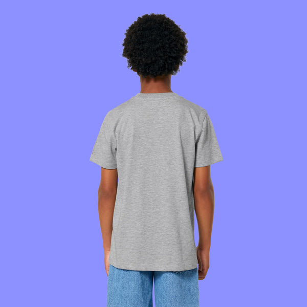 Back view of a child wearing the heather grey Woke Up And Chose Violence Hamster Kids Tee by Katie Abey. Organic cotton kids t shirt with short sleeves and a relaxed fit, shown from behind against a purple background.