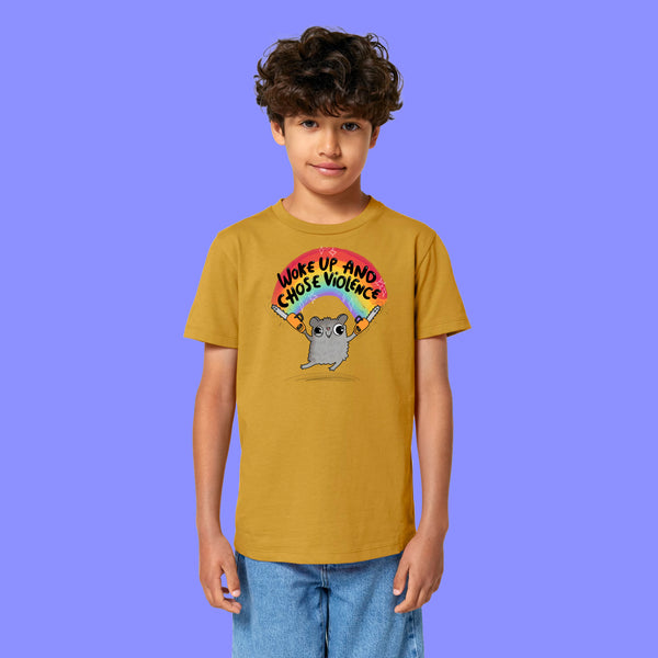 Front view of a child wearing the ochre Woke Up And Chose Violence Hamster Kids Tee by Katie Abey. Features a colourful hamster illustration with rainbow and slogan, printed on a soft organic cotton kids t shirt.