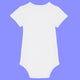 White baby short sleeve babygrow shown from the back. Minimal plain design made from organic cotton with soft rib binding at the neckline and leg openings. Features snap fastenings at the bottom for easy changing.