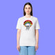 White Woke Up And Chose Violence Hamster Adults Tee worn by a model from the front. The design shows a cute hamster holding chainsaws beneath a rainbow with bold slogan text, created by illustrator Katie Abey.