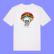 White unisex T shirt laid flat showing the front design. The Woke Up And Chose Violence Hamster Adults Tee by Katie Abey features a cute grey hamster holding chainsaws under a rainbow with the slogan Woke Up And Chose Violence in bold lettering.