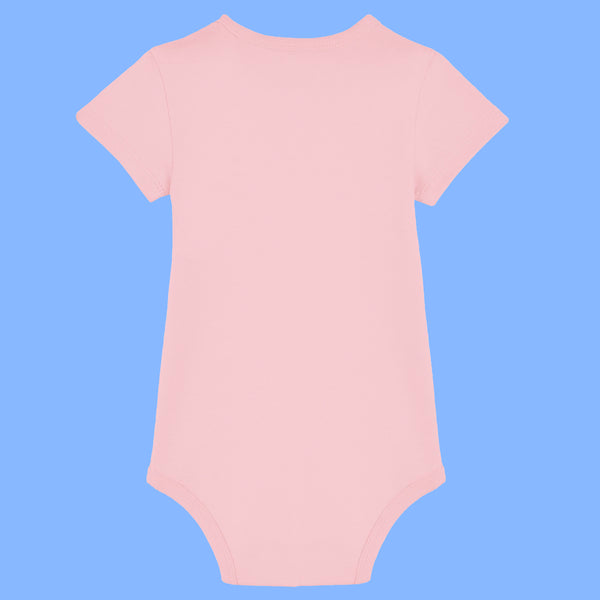 Cotton pink baby grow back view made from soft organic cotton with short sleeves and envelope neckline. Plain back design of the Katie Abey Poo Machine babygrow for babies aged 0 to 24 months. Funny novelty baby clothing by UK illustrator Katie Abey.