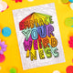 A6 Greetings Postcard with Embrace Your Weirdness written in bold rainbow coloured writing, on a white background with pencil scribbles. Designed by Katie Abey in the UK