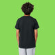 Back view of child wearing Embrace Your Weirdness kids t shirt by Katie Abey in black. Plain back organic cotton tee shown on model with short sleeves and comfortable fit. Ideal kids clothing for play and self expression.