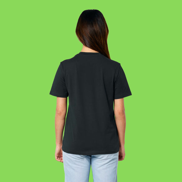 Back view of a second model wearing the black Embrace Your Weirdness adults t shirt. The simple back design highlights the comfortable everyday fit.