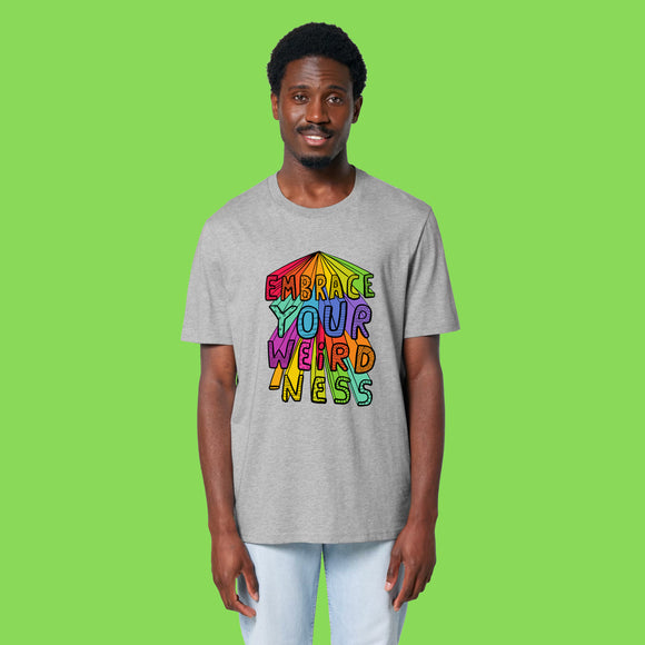 Front view of a second model wearing the heather grey Embrace Your Weirdness adults t shirt. The relaxed unisex fit and bold rainbow style illustration are clearly visible against the soft grey fabric.