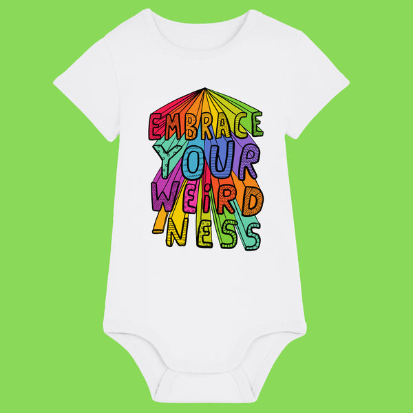 White baby babygrow with colourful Embrace Your Weirdness Katie Abey illustration on the front. Rainbow text artwork celebrating creativity and self expression. Organic cotton baby vest with short sleeves and popper fastenings, ideal for quirky baby outfits.
