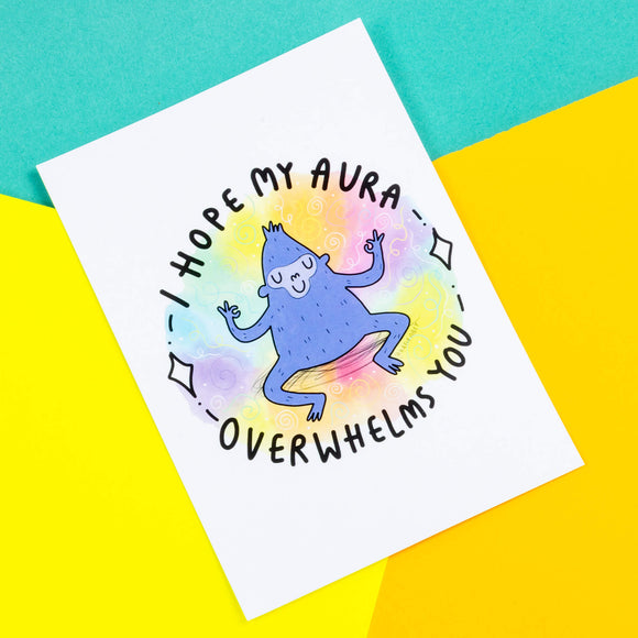 A postcard of a zen gorilla illustration by Katie Abey with I hope my aura overwhelms you written around it.