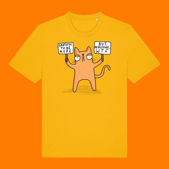 Front view of the Katie Abey Grateful To Be Here But Respectfully WTF adults graphic t shirt in spectra yellow. Features a humorous orange cartoon cat holding two protest signs with funny wording. Quirky graphic tee illustrated by Katie Abey.
