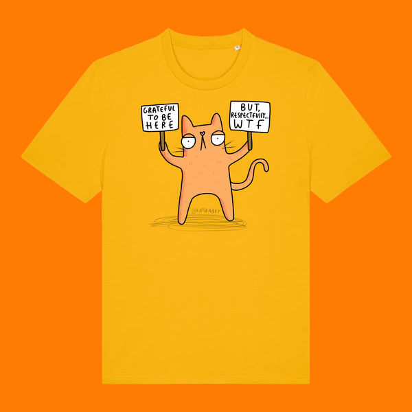 Front view of the Katie Abey Grateful To Be Here But Respectfully WTF adults graphic t shirt in spectra yellow. Features a humorous orange cartoon cat holding two protest signs with funny wording. Quirky graphic tee illustrated by Katie Abey.
