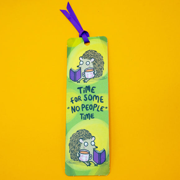 Full length Katie Abey hedgehog bookmark with repeating hedgehog illustrations reading and relaxing. Text reads “Time for some ‘No people’ time”. Bright green design with purple ribbon, perfect for cosy reading, book gifts and quirky stationery lovers.