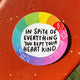 In spite of everything you kept your heart kind vinyl sticker, rainbow background with black writing and white stars. Designed by Katie Abey in the UK