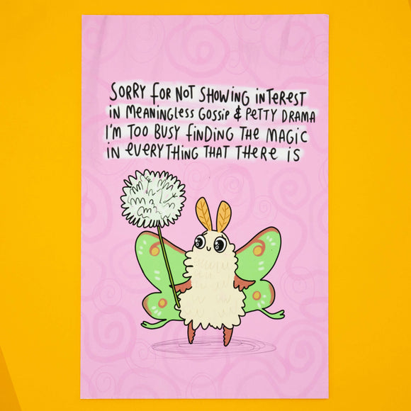 Katie Abey "Sorry For Not Showing Interest In Meaningless Gossip" moth art print. Illustrated fluffy moth with green wings holding a magic dandelion puff against a pink swirly background. A4 signed and numbered matte print, limited to 10. Perfect weird and whimsical wall art for unique homes.