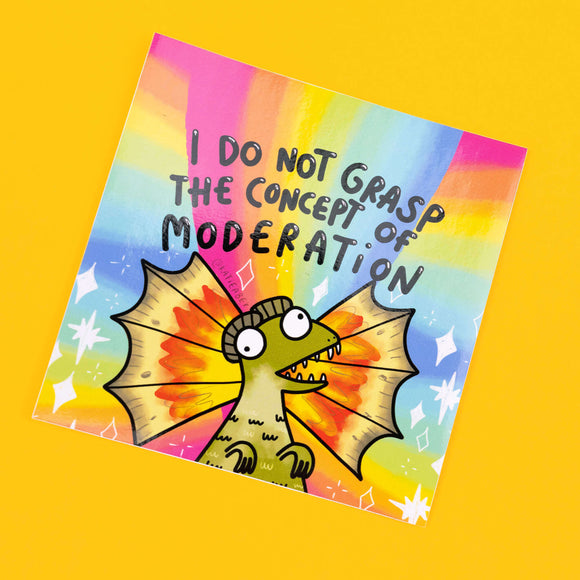 Katie Abey vinyl sticker depicting a quirky green creature with large, colourful wing-like frills, set against a vibrant rainbow background. The sticker boldly states 'I Do Not Grasp The Concept of Moderation' in playful black lettering