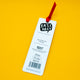 Back of Katie Abey My Bookmark Monkey bookmark with red ribbon on bright yellow background. Features Katie Abey logo, barcode and product details. Cute illustrated bookmark by quirky UK artist encouraging individuality and creativity.