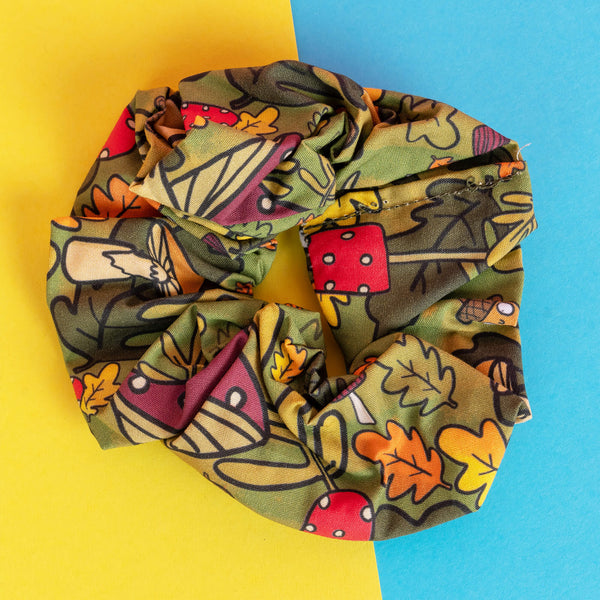 Mushroom Boi's Hair Scrunchie for hair, with illustrated green earthy mushroom design. Designed in the UK by Katie Abey