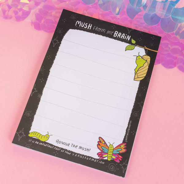 Top view of the Katie Abey notepad with metamorphosis-themed illustrations, ideal for capturing your thoughts and embracing change. Features the text “Mush from my Brain.”