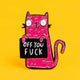 Close-up of a Katie Abey soft enamel pin, showcasing a whimsical pink cat with a mischievous expression, holding a sign that reads 'Off You Fuck'. The cat stands out against a bright yellow background