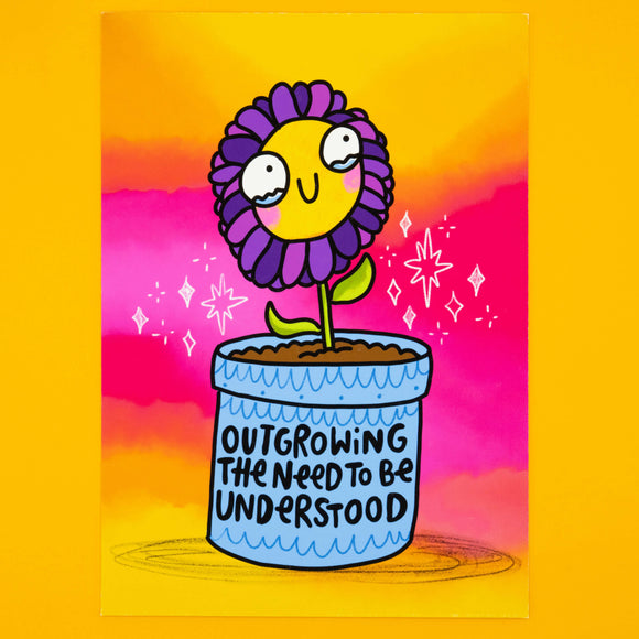 Full view of Katie Abey’s Outgrowing The Need To Be Understood flower art print. Cute illustrated purple flower smiling in a pot with affirmation text, set against a pink and yellow gradient background. A4 signed matte print, quirky positive wall decor.