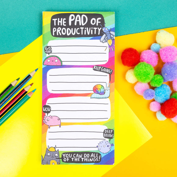 the pad of productivity by Katie Abey is a thin pad of paper with fun characters and says you can do all the things on it. It is on a bring colourful base
