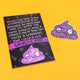 A glittery purple poop-shaped sticker with a funny expression, featuring googly eyes and a lopsided smile. The background is bright yellow. This playful design is from Katie Abey, a small colourful company for fun likeminded weirdos.