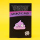 Close-up of the Galactic Poo enamel pin on its backing card by Katie Abey. The sparkly purple poo character has big cartoon eyes, black outlines, and sits under an empowering stardust-themed quote.