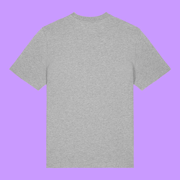 Back view of a heather grey organic cotton unisex adults t-shirt by Katie Abey on a purple background. Plain rear of the Prioritising Whimsy, Nonsense and Joy graphic tee showing the relaxed everyday fit and soft single jersey fabric.