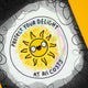 Close-up of Katie Abey’s A4 “Protect Your Delight At All Costs” art print. A cheerful sunshine character beams from the centre with bold black text. Printed on matte finish foam-backed board, signed and numbered by the artist. A quirky limited edition wall print to spark joy, positivity and colour in your home.