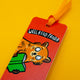 Close up of Katie Abey Well Read Panda Red Panda Bookmark with orange ribbon, featuring cute red panda reading a green book on a red background. Fun illustrated bookmark for book lovers by independent UK artist.