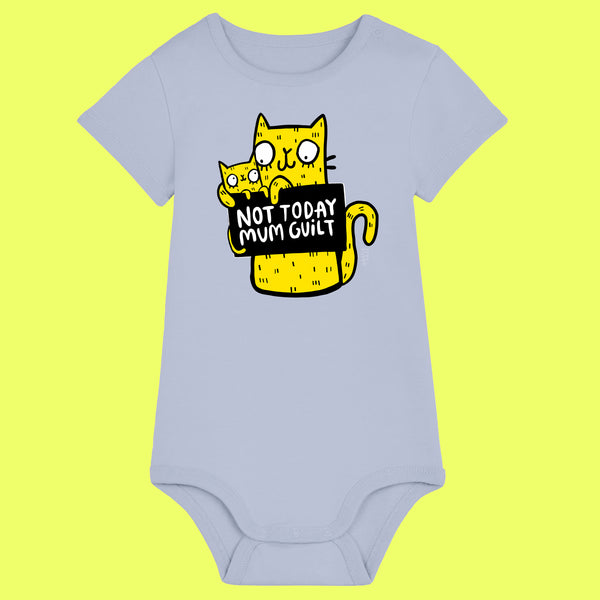 Serene blue organic cotton baby grow featuring a quirky yellow cat illustration holding a sign reading “Not Today Mum Guilt”. Designed by UK illustrator Katie Abey, this funny and relatable babygrow combines playful humour with soft organic fabric, perfect for babies and a great gift for new parents.