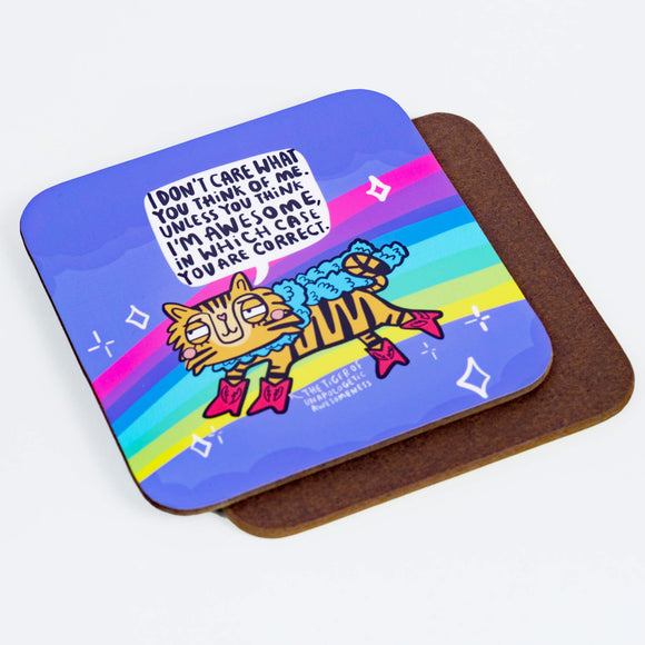 A coaster with a tiger  wearing fancy pink cowboy boots and a fluffy scarf saying, 'I son't care what you think of me. Unless you think I'm awesome, in which case you are right.'