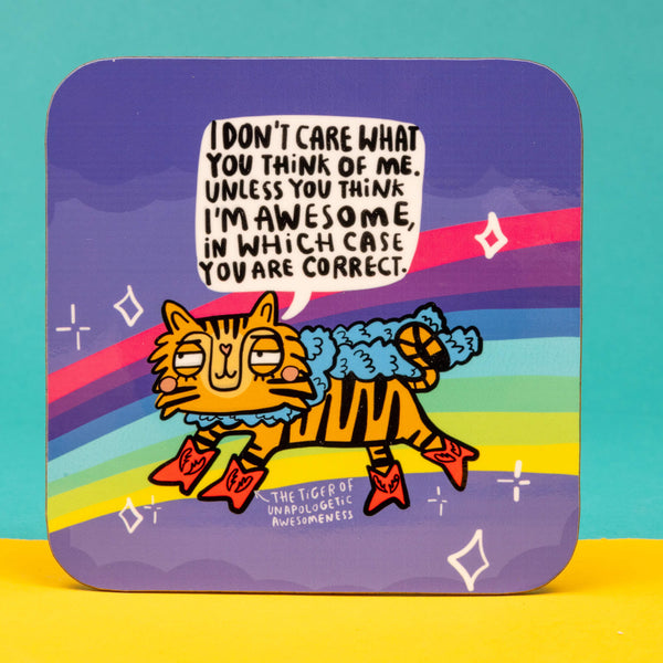 A coaster with a tiger wearing fancy pink cowboy boots and a fluffy scarf saying, 'I son't care what you think of me. Unless you think I'm awesome, in which case you are right.'