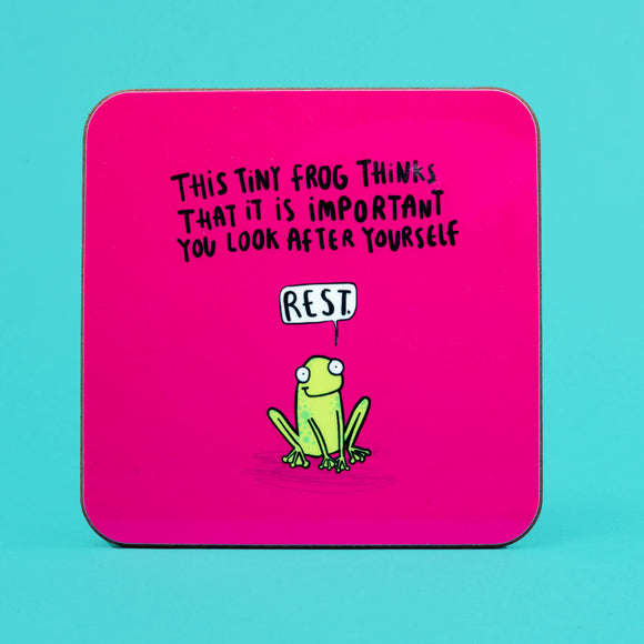 the tiny frog of rest is a cute illustration by Katie Abey on a pink base coaster with text saying This tiny frog thinks that it is important you look after yourself with a speech bubble saying REST