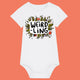 White organic cotton baby bodysuit featuring the “Weird-Ling” illustration by Katie Abey. Cute botanical artwork with mushrooms, leaves and bold lettering encouraging little ones to embrace their weird side. Short sleeve baby grow with shoulder snaps and poppers for easy dressing.