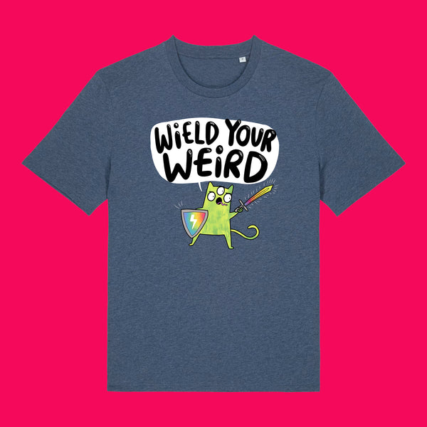 Front view of the Wield Your Weird Adults T Shirt by Katie Abey in dark heather blue. Features a bold illustrated character holding a sword and shield with the slogan Wield Your Weird, displayed on a bright pink background.