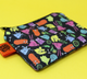 Small Animals print coin purse funny colourful rats hedgehogs guinea pigs rabbits squirrels hamsters on black background. Design by Katie Abey in the UK