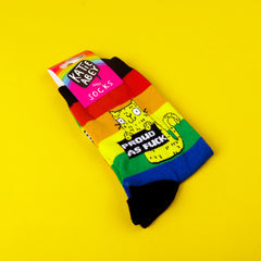 Pack of nine sweary cat socks with cat design on rainbow knitted pattern. 76% cotton, 22% polymide, 2% elastane. Yellow cat holding sign on striped pattern. Designed by Katie Abey in the UK